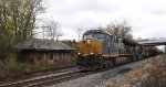 CSX 3408 leads a consist of HERZOG hoppers east at TL's MP 50